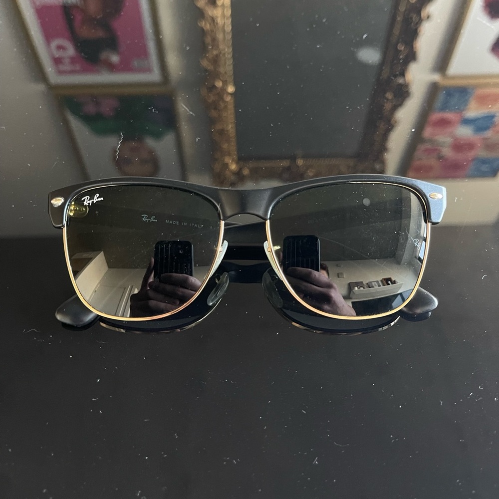 Women’s RayBan sunglasses in Black and Gold